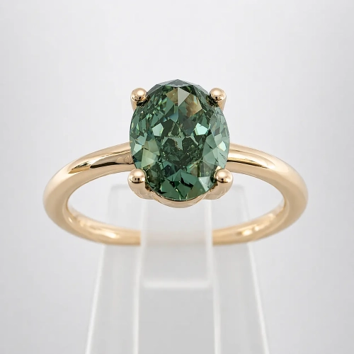 Pierścionek z zielonym diamentem owal złoto 585 – widok frontalny – ABGOLD Baczyński