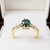 Pierścionek vintage z topazem London blue – ekspozycja na podstawce – ABGOLD Baczyński